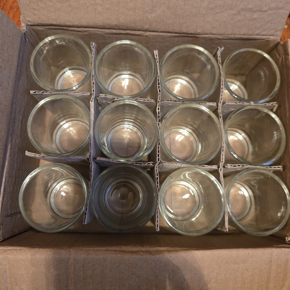 Tealight candle holders. Box of 12. Never used.